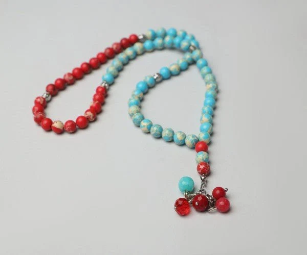 Al-Fardoos Rosary - Turquoise and Red Agate - Image 3